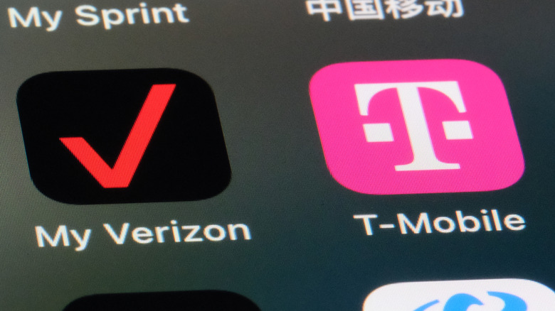 Verizon and T-Mobile icons on smartphone home screen