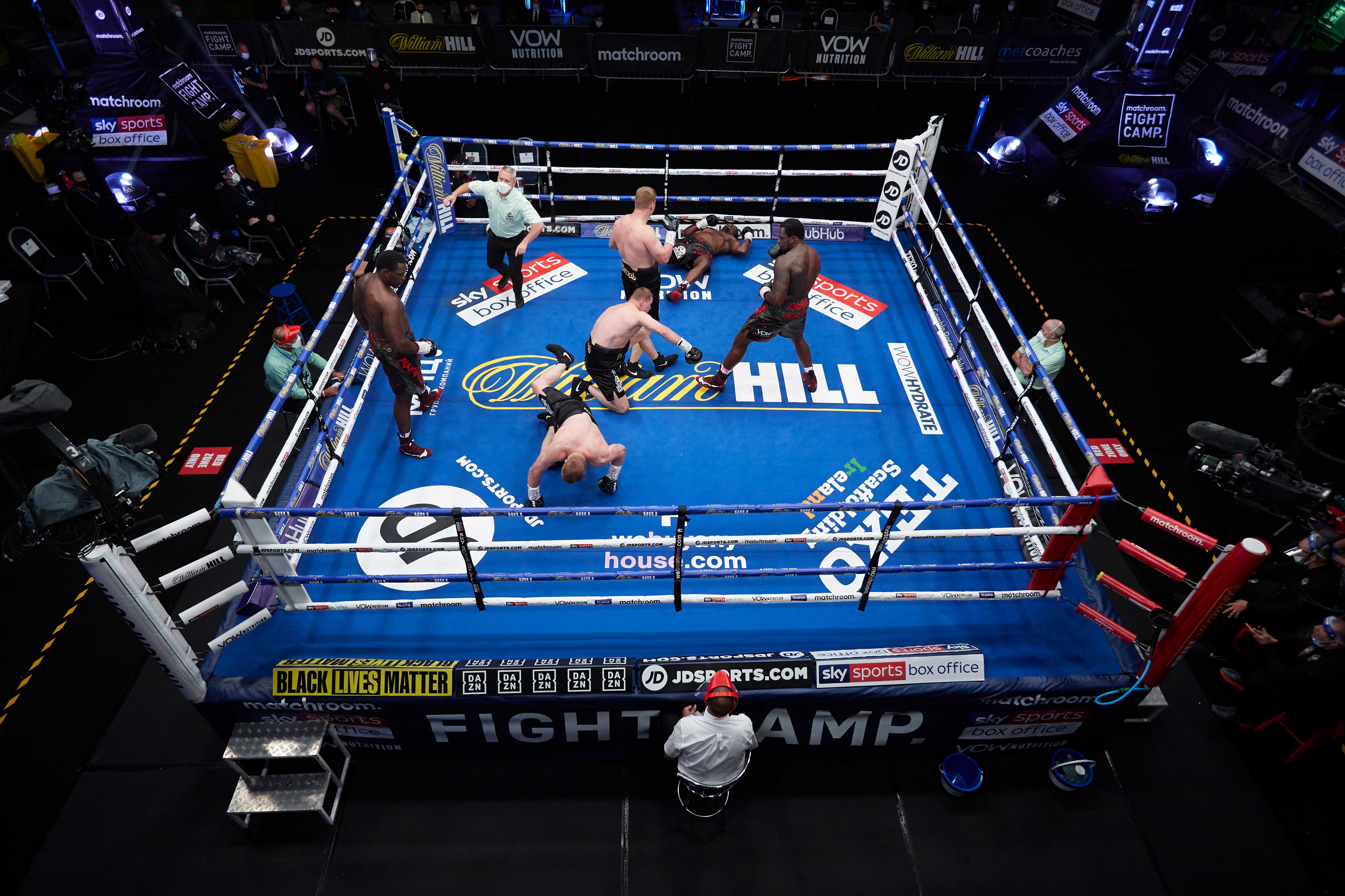 Boxer knocked down in boxing match.