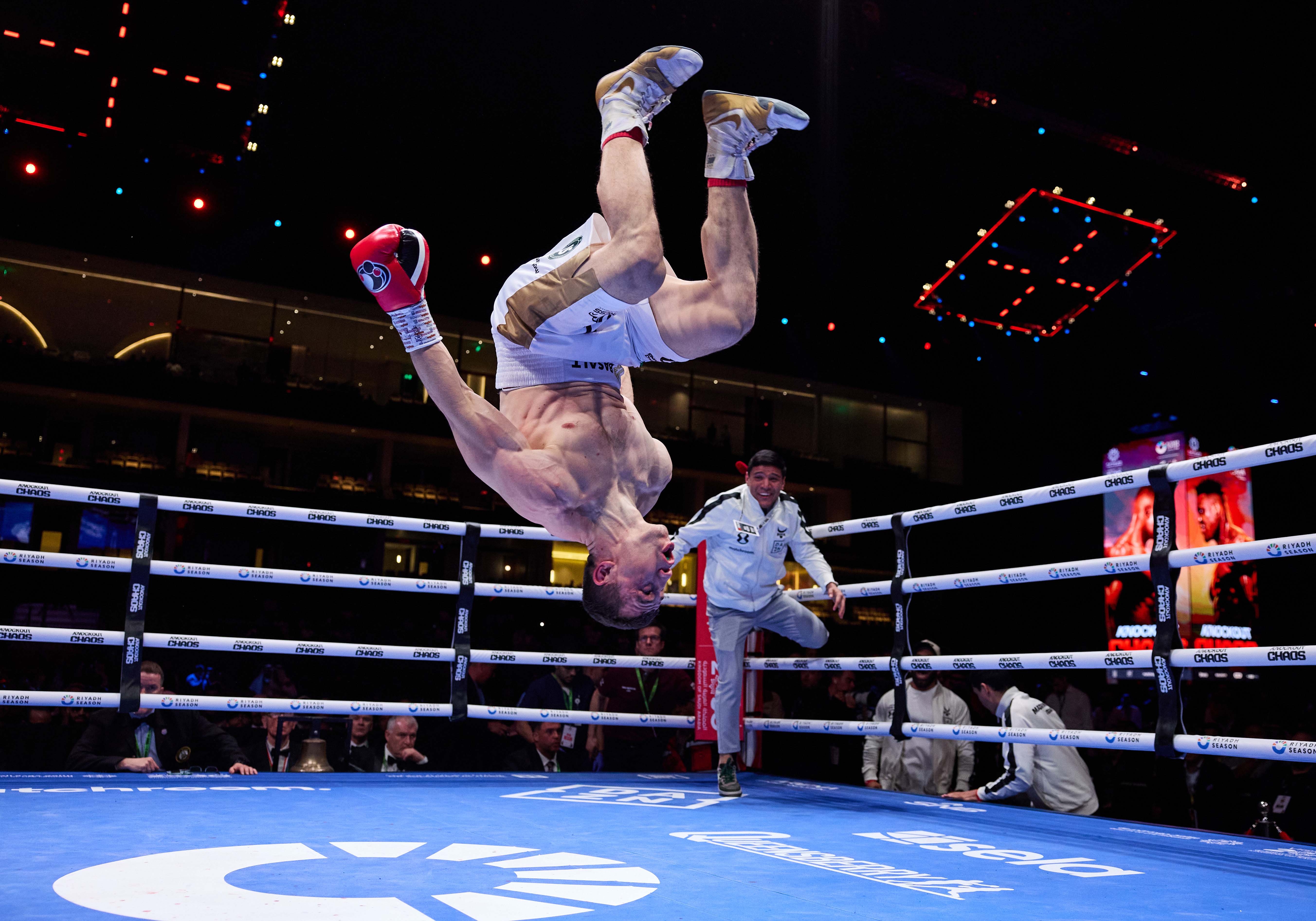 Israil Madrimov celebrates a boxing victory.
