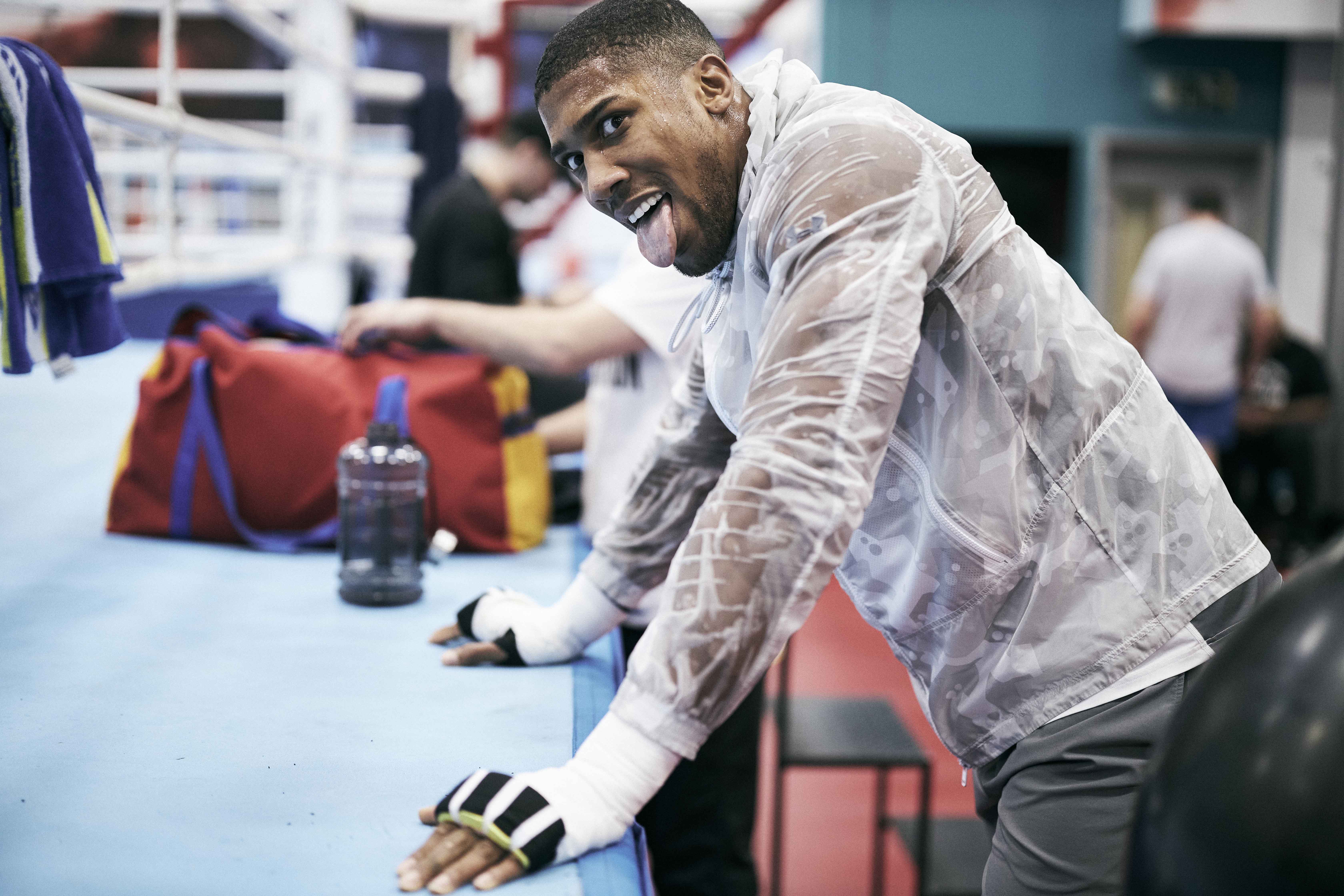 Anthony Joshua sticking his tongue out during a training session.