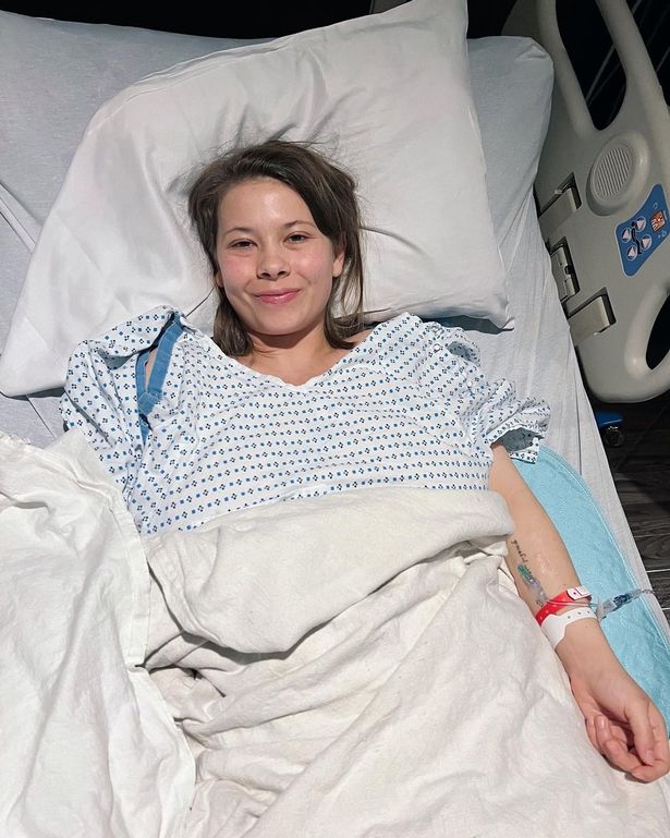 Bindi Irwin in a hospital bed in 2023