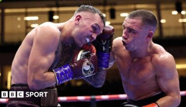 Nick Ball lands a punch on Sam Goodman