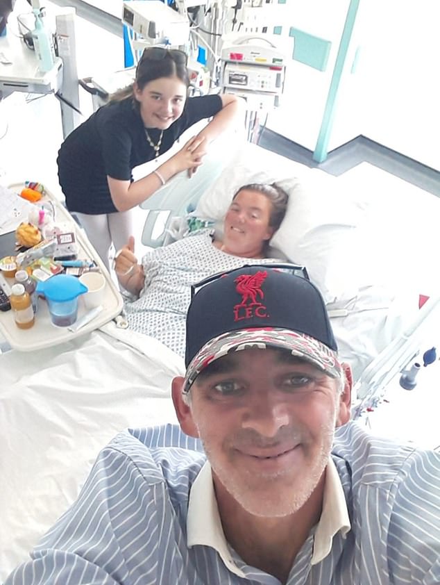 Cheryll Rich, 38, broke her back after tumbling into a canal lock last summer. She is pictured at St Mary's Hospital, London, with her partner, Jack Barnes, and daughter Misty Barnes, 12, before she moved to Basildon University Hospital where her ill-treatment took place