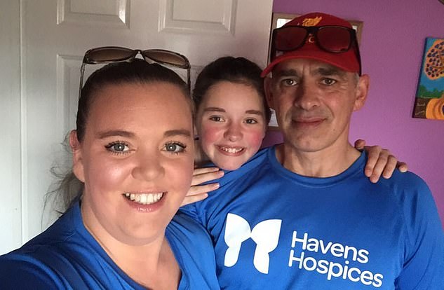 Cheryll was supporting her partner, Jack, during a fundraising kayak trip when she broke her back. She is pictured with Jack and daughter Misty before the accident
