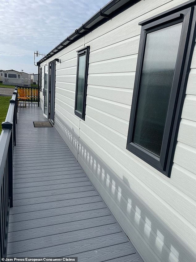 In 2023, another salesperson suggested upgrading to a caravan they could rent out more easily - and for more money - costing a further £25,000. Pictured: The new veranda - cheap at double the price