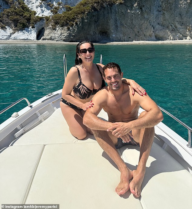 Kelly Brook sent temperatures soaring in a black leaf-print bikini as she shared a slew of Instagram snaps from her romantic getaway with her husband Jeremy Parisi