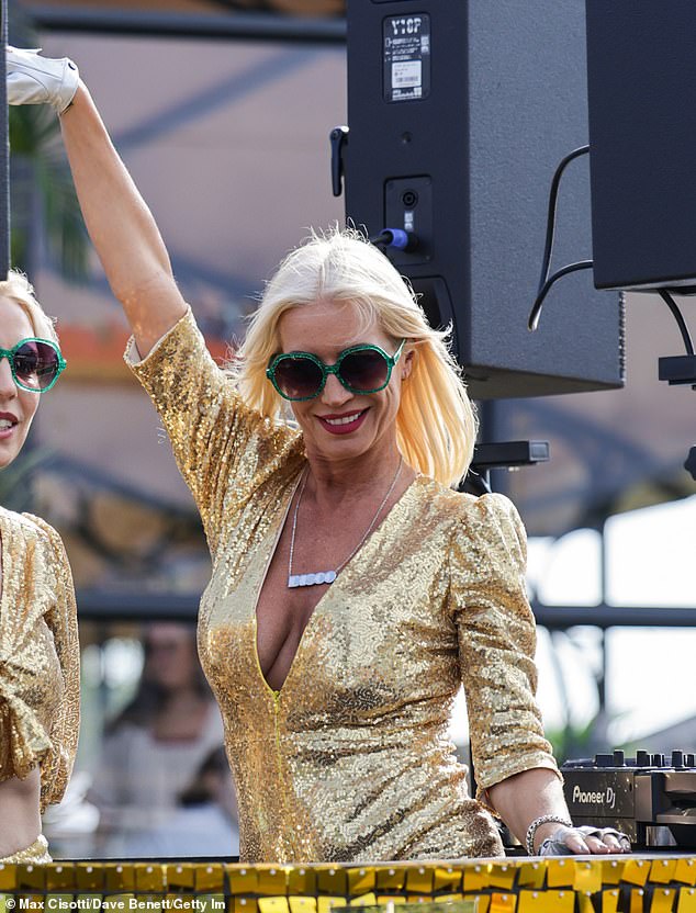 The Big Breakfast star, 51, delighted fans at the festival as she was seen behind the DJ decks partying away with crowds of fans