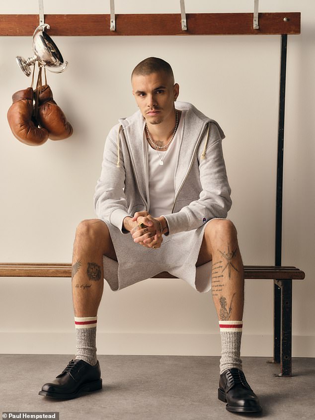 Romeo Beckham proved that modelling prowess certainly runs in the family as he posed for a stylish new shoot with iconic athletics brand Champion