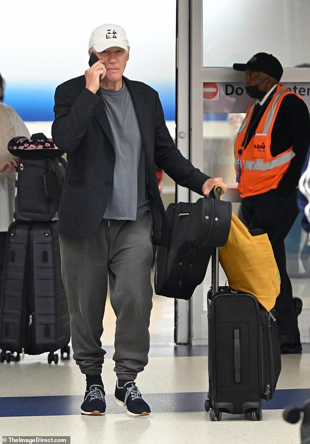 The airport sighting comes amid the ongoing fallout over the property he sold that once belonged to music legend Paul Simon