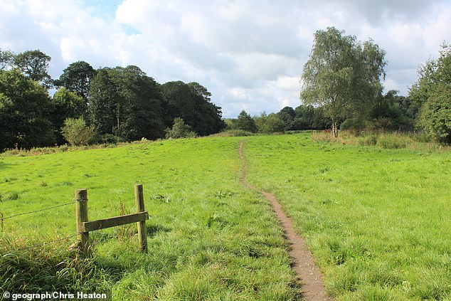 The woman was reportedly walking with a child at the Lancashire park (pictured) when the tragedy happened