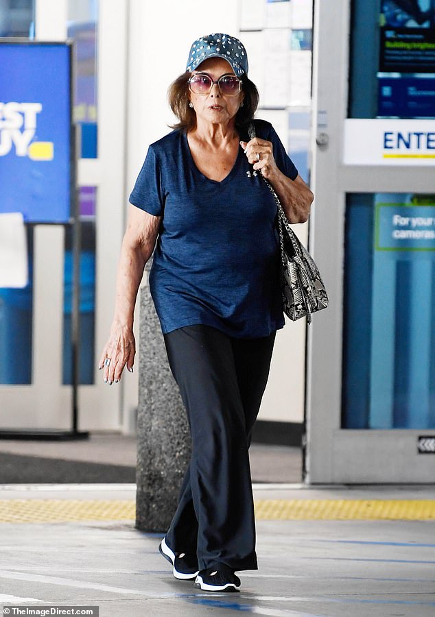 This actress, who once starred in an iconic James Bond scene, looked unrecognizable during a rare outing in Los Angeles this week. Can you guess who she is?