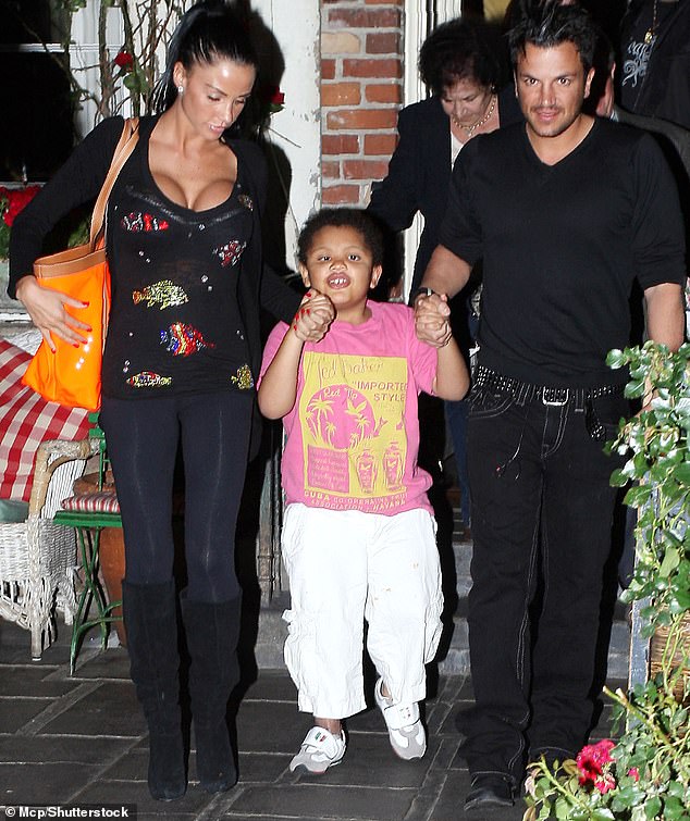 Katie Price, Peter Andre, and Katie's son Harvey in 2009 in Los Angeles. Peter has been accused of mocking Harvey, who is autistic and disabled, some time during the mid-2000s
