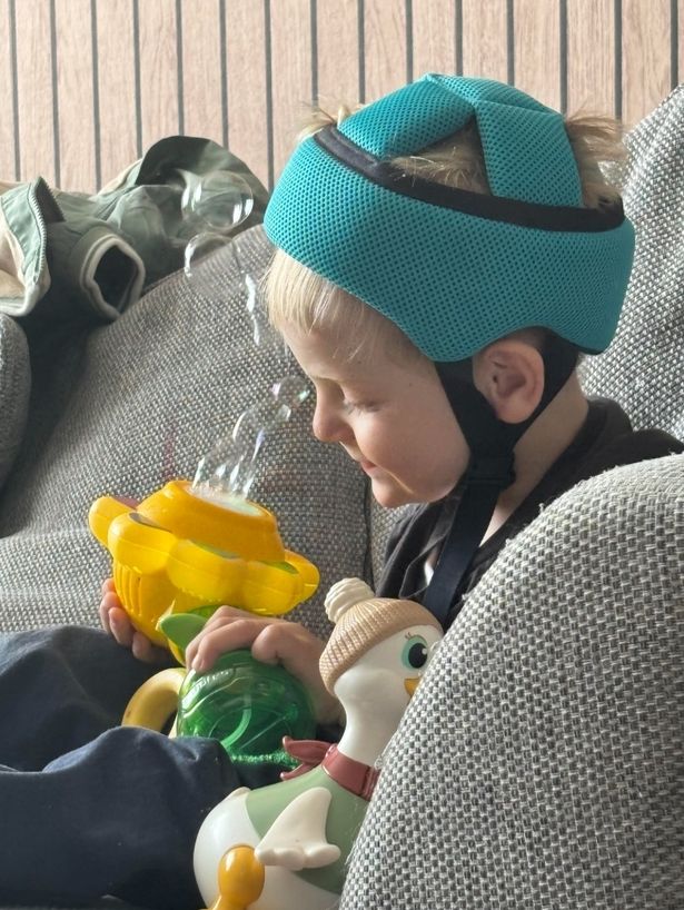 Myles wearing a helmet