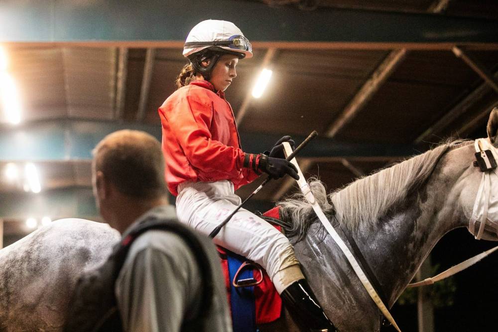 MIKAELA MACKENZIE / FREE PRESS
Assiniboia Downs CEO Darren Dunn praised Winnipeg jockey Ciera Pruitt (seen here on Kate’s Princess in the final race of the night) for keeping her mount on War Is Hell after Take Charge Tom clipped the horse early into the Derby race. Dunn said there could have been an accident had it not been for Pruitt.