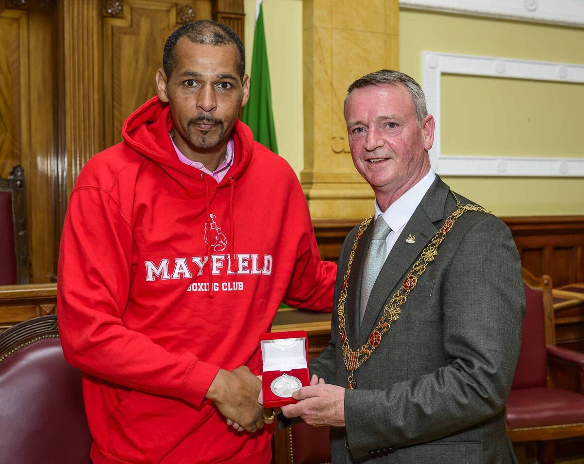 Odibo Aigbologa of Mayfield BC receiving the Coaches Medal as a member of Corks Boxing Club Of The Year from Lord Mayor Cllr Fergal Dennehy at an awards ceremony in Cork City Hall recently. Picture: Doug Minihane