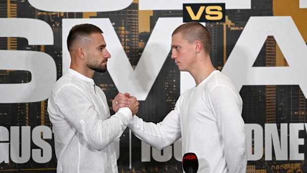 Lulzim Ismaili (left) and Nikita Tszyu face off in Sydney on Monday.