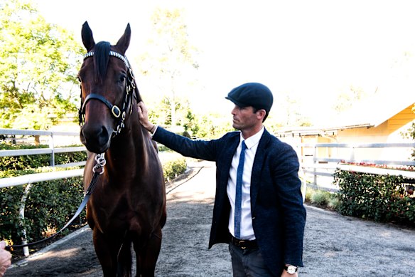 Godolphin trainer James Cummings with retired star Anamoe.