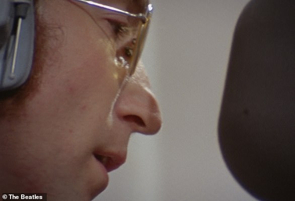 Lennon played the song while a cassette recorder was running on top of his piano, although it was at the time unfinished. He's pictured here during studio sessions for Imagine (1971)