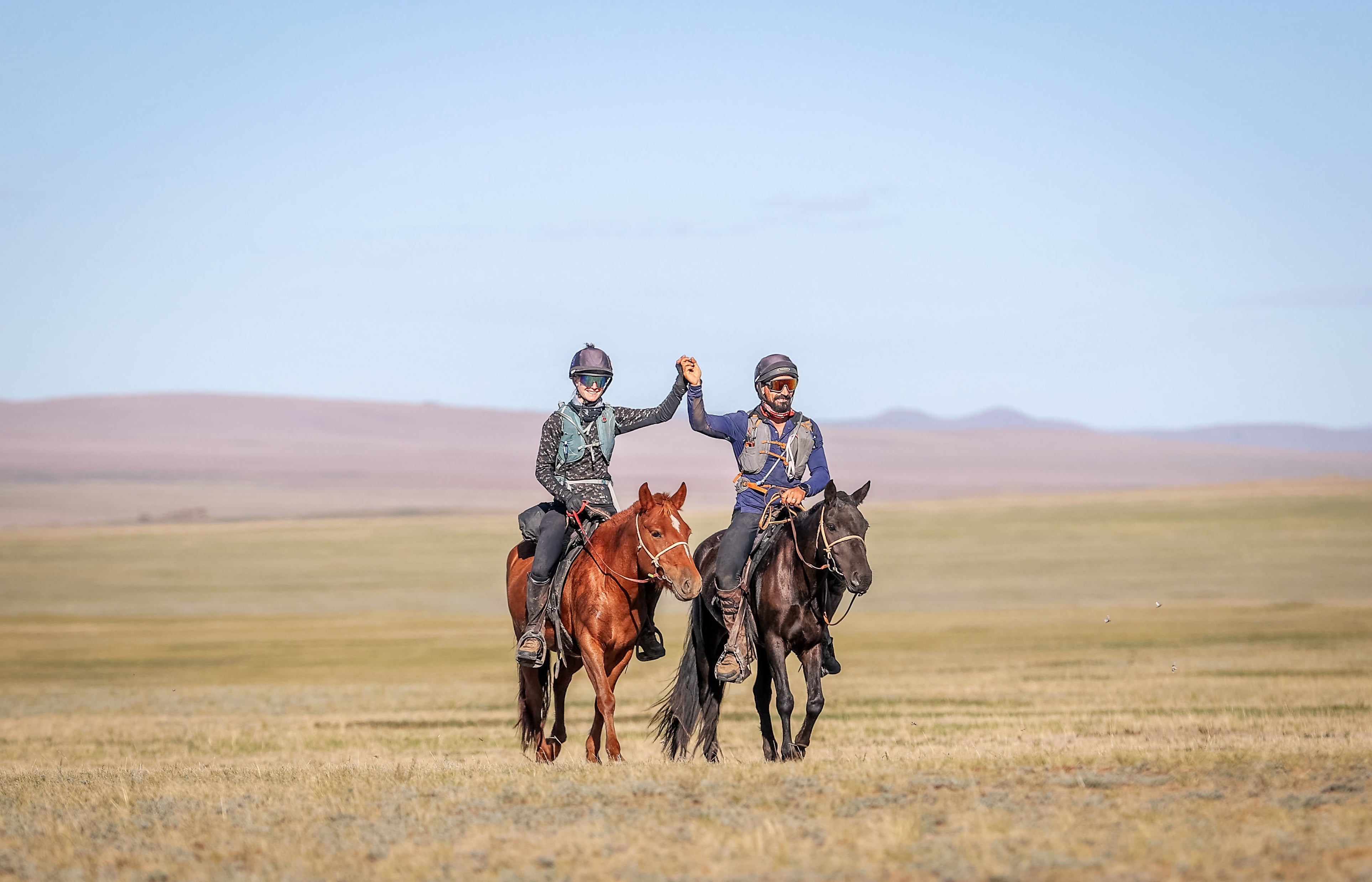 Throughout the race, riders found themselves cantering through wide open valleys, navigating mountain passes, crossing rushing rivers, and traversing rolling dunes