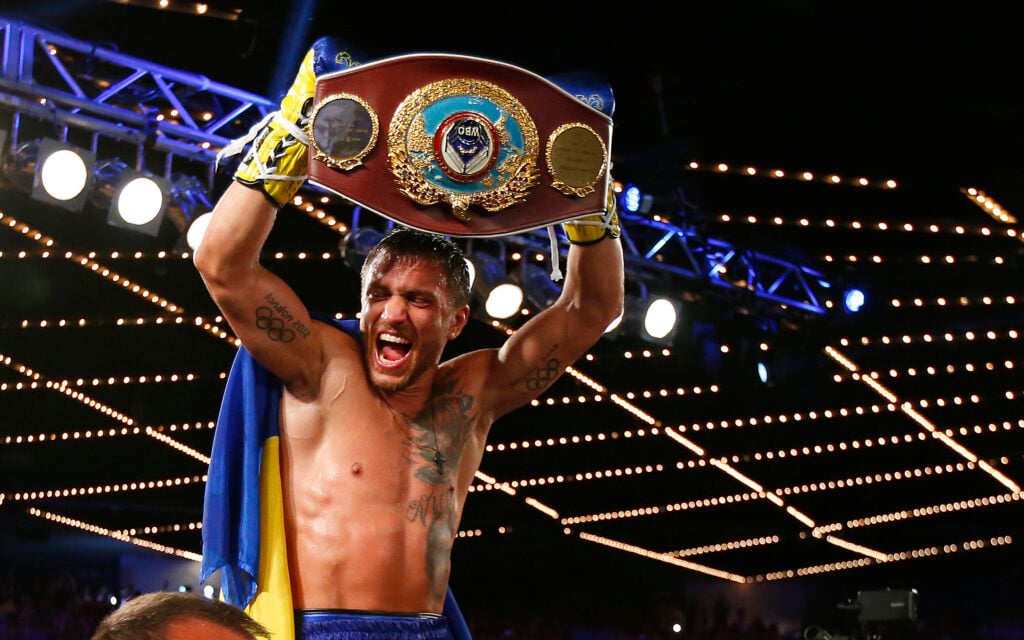 Vasiliy Lomachenko celebrates defeating Roman Martinez
