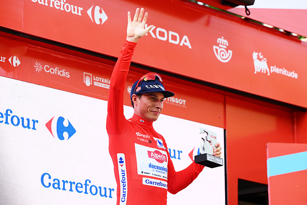 NOVARA, ITALY - AUGUST 23: Jasper Philipsen of Belgium and Team Alpecin - Deceuninck celebrates at podium as Red Leader Jersey winner during the La Vuelta - 80th Tour of Spain 2025, Stage 1 a 186.7km stage from Torino-Reggia di Venaria to Novara / #UCIWT / on August 23, 2025 in Novara, Italy.