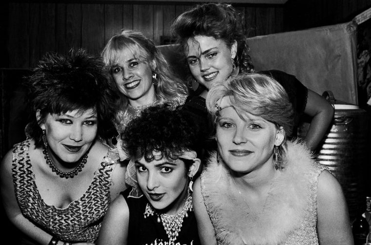 Portrait of the music group the Go-Go's as they pose backstage at an unspecified venue, Chicago, Illinois, July 30, 1981. Pictured are, from left, Kathy Valentine, Charlotte Caffey, Jane Wiedlin, Belinda Carlisle, and Gina Schock. (Photo by Paul Natkin/Getty Images)