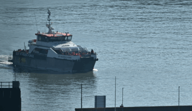 UK pledges extra 100m pounds to tackle people-smuggling gangs