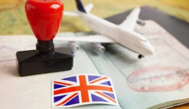 Visa and passport document with atamp and United Kingdom flag to immigration at airport in country.