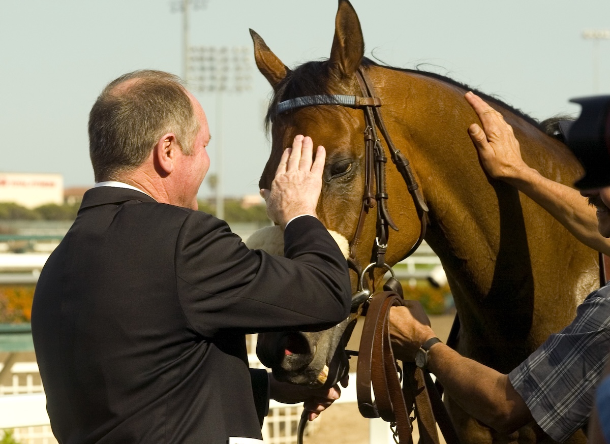 Win or lose, Mandella always was always there to greet The Tin Man after his races. (Benoit photo)