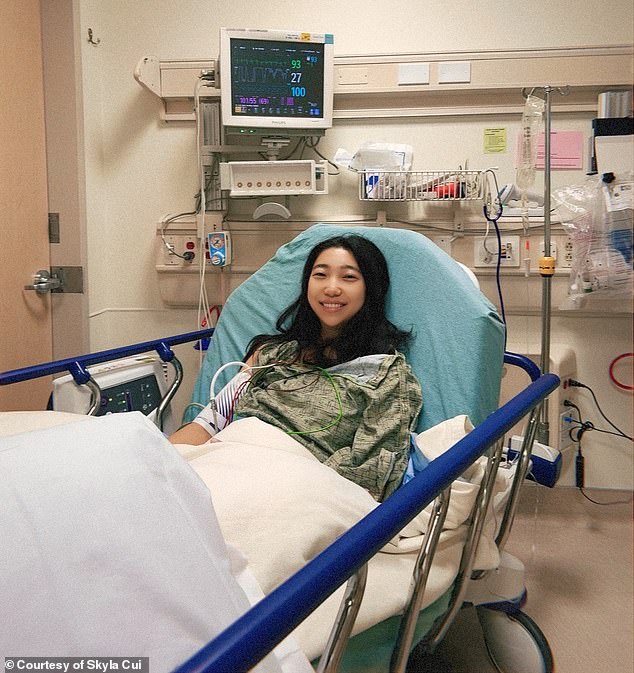 Cui, pictured here in the hospital, underwent several scans, including an MRI, CT, PET scan and biopsies before she received her diagnosis in June 2025