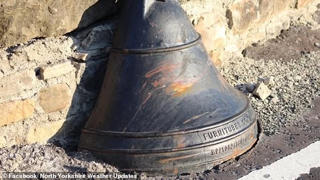 The small bell has become a hazard of its own, as cars have started to hit the bell while crossing the bridge