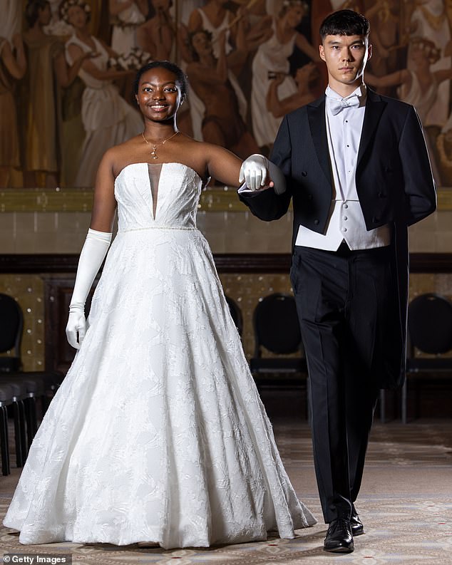 The debutantes were escorted by young men, who accompanied them as they danced the night away at the lavish do (a couple pictured attending the event in 2023)