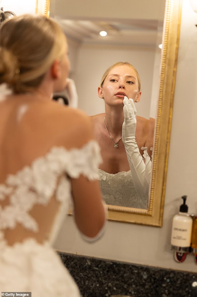 An army of professional hair and make-up artists are on hand to make sure that the girls are glowing for the event (pictured: an attendee at the 2025 event)