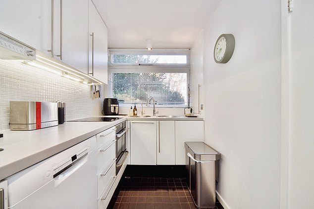 The fitted kitchen is contemporary - but not exceedingly generous in size given the hefty price tag