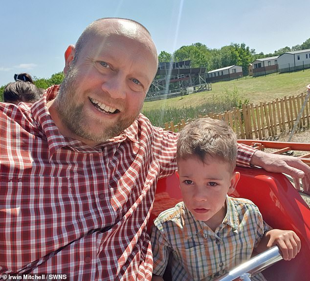 Nick pictured with his son Harry who Nick said 'can't get to feel Natasha's love first-hand'