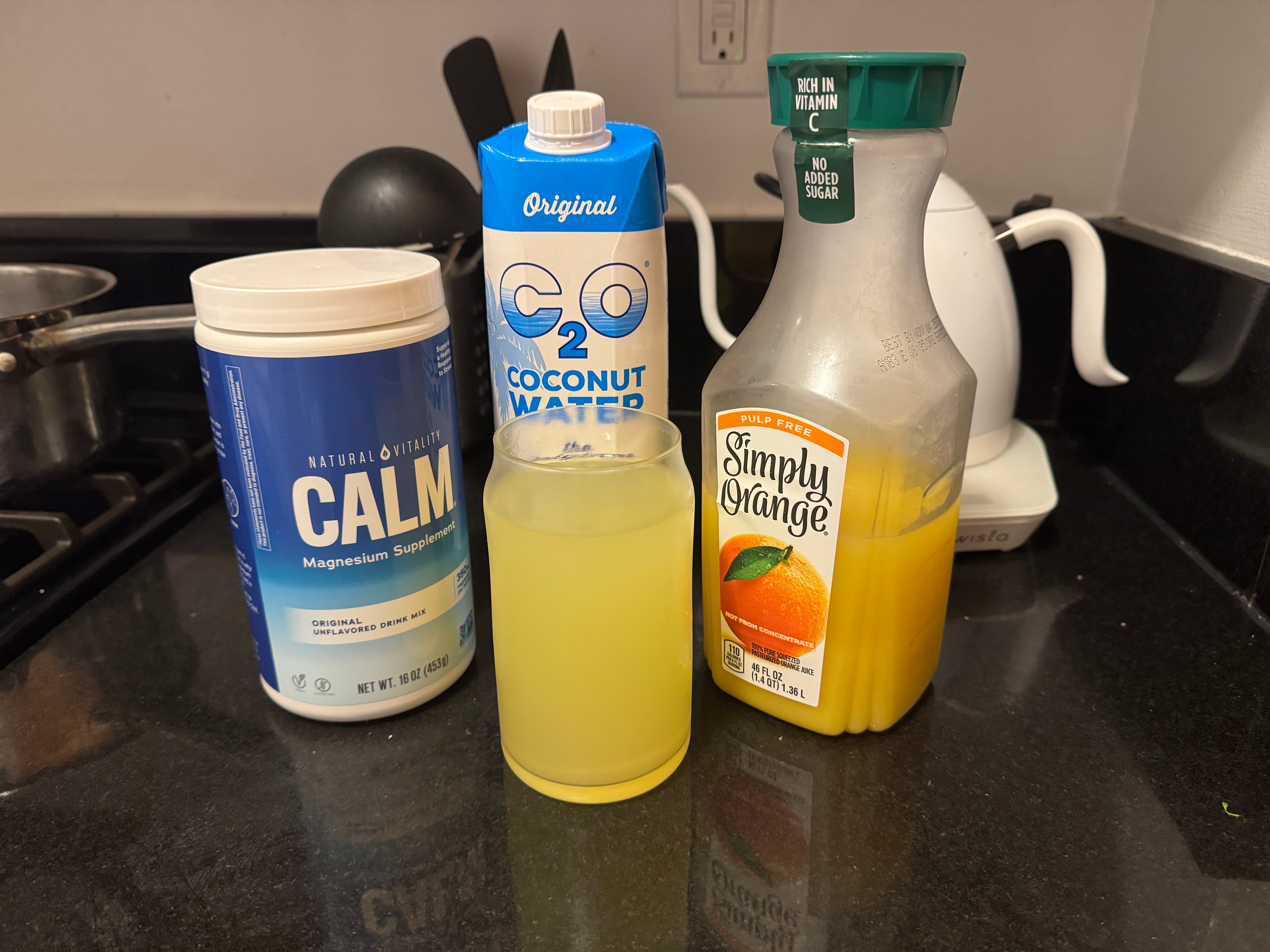 The cortisol cocktail combines orange juice, coconut water, and magnesium powder