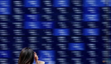 Asia stocks buoyed by AI rush, gold at fresh peaks