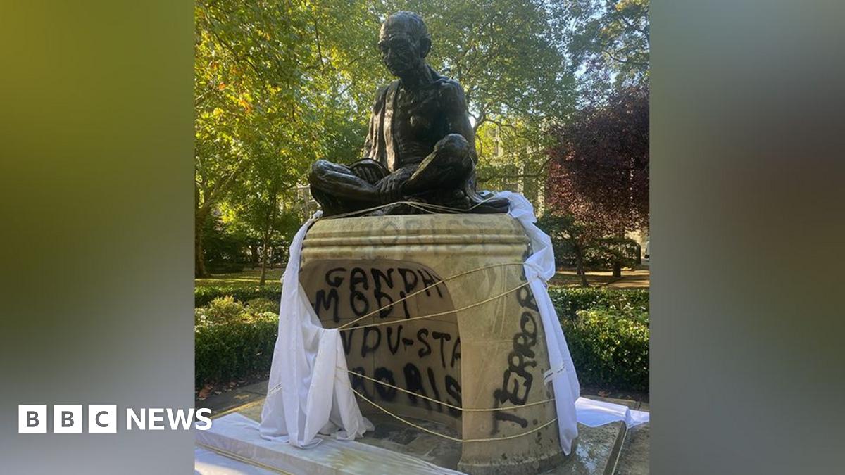 Graffiti on statue of independence hero Mahatma Gandhi in Tavistock Square, London 30 September 2025
