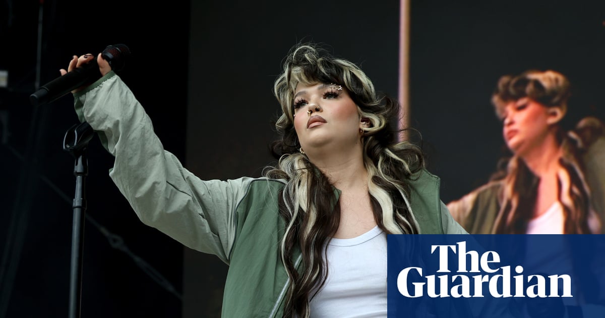 Lola Young ‘doing OK’ after collapsing on stage at festival in New York | Music