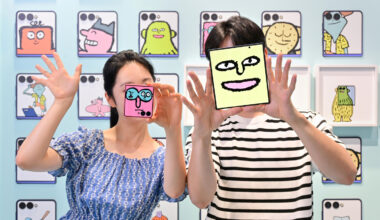Visitors pose for the camera as they participate at an experience zone hosted by Samsung Electronics to promote its Galaxy Z Fold 7 and Z Flip 7 in southern Seoul's Coex in July 2025. [SAMSUNG ELECTRONICS]