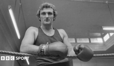 Joe Bugner posing in a gym in the 1970s