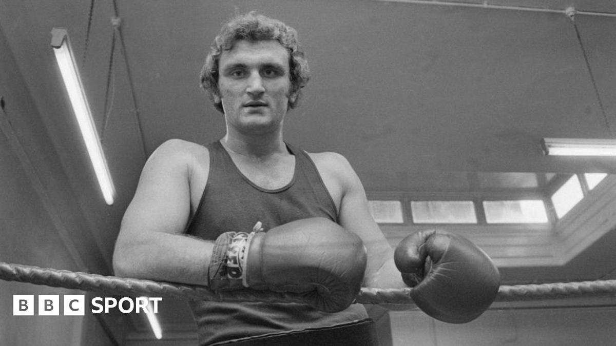 Joe Bugner posing in a gym in the 1970s