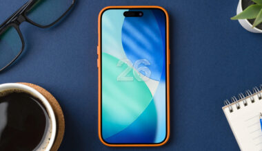 iPhone 16 Pro screen with new iOS 26 logo