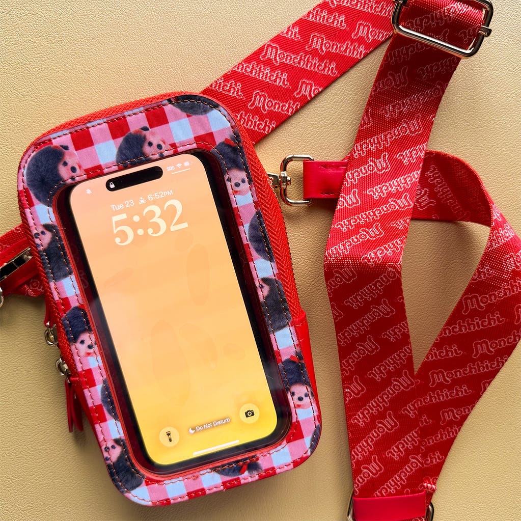 The Sonix x Monchhichi Phone Wallet attached to a phone.
