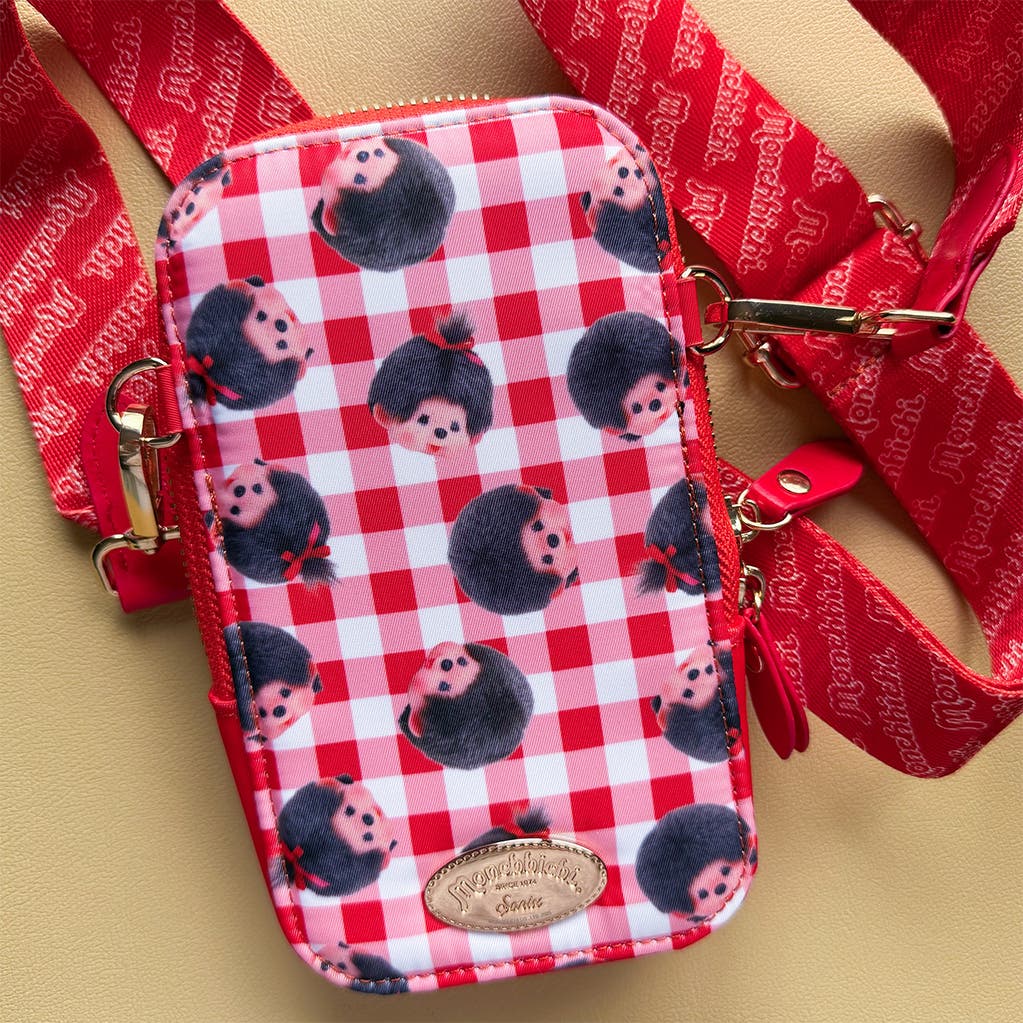 The Sonix x Monchhichi Phone Wallet attached to a phone.