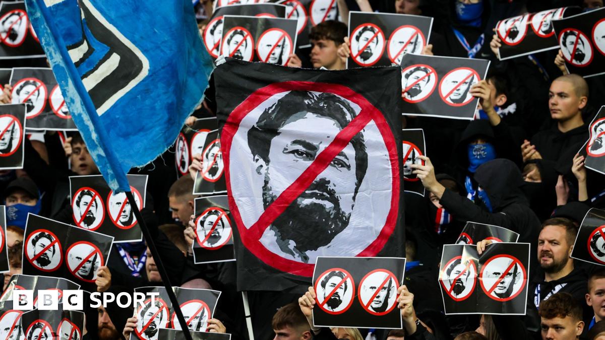 Russell Martin and Nico Raskin embrace as the midfielder is substituted