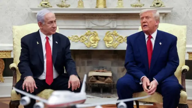 Donald Trump and netanyahu sit side by side