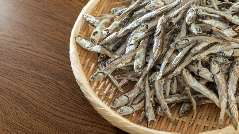 Small dried fish in a woven basket