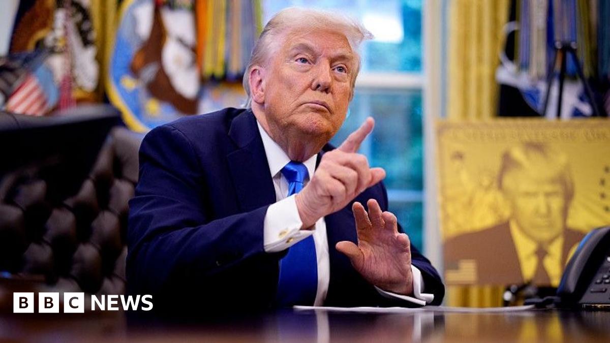 President Donald Trump takes a question from a reporter before signing executive orders in the Oval Office at the White House on September 19, 2025 in Washington, DC. Trump signed two executive orders, establishing the "Trump Gold Card" and introducing a $100,000 fee for H-1B visas.