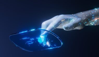 An artificially generated hand tapping on a clear digital surface suspended in the air.